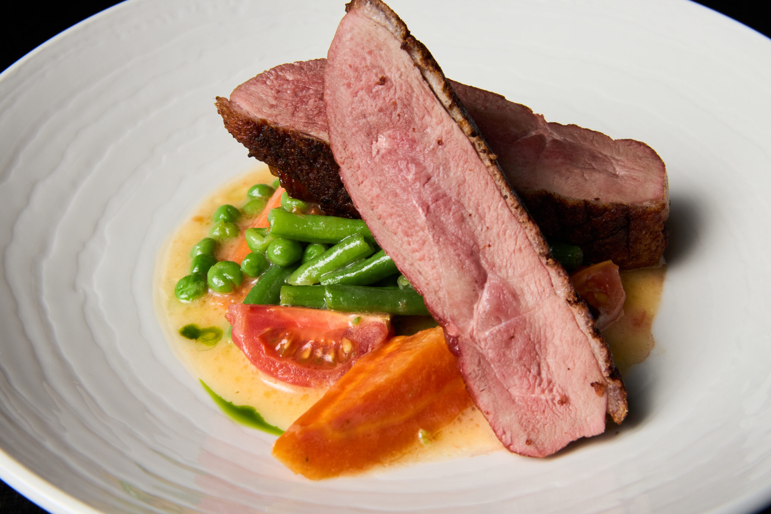 Duck fillet with seasonal vegetables