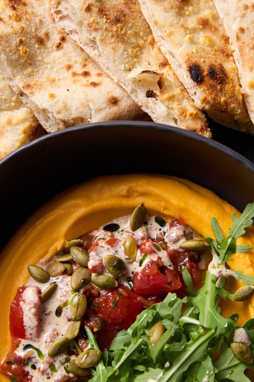 Pumpkin hummus with tomato salsa