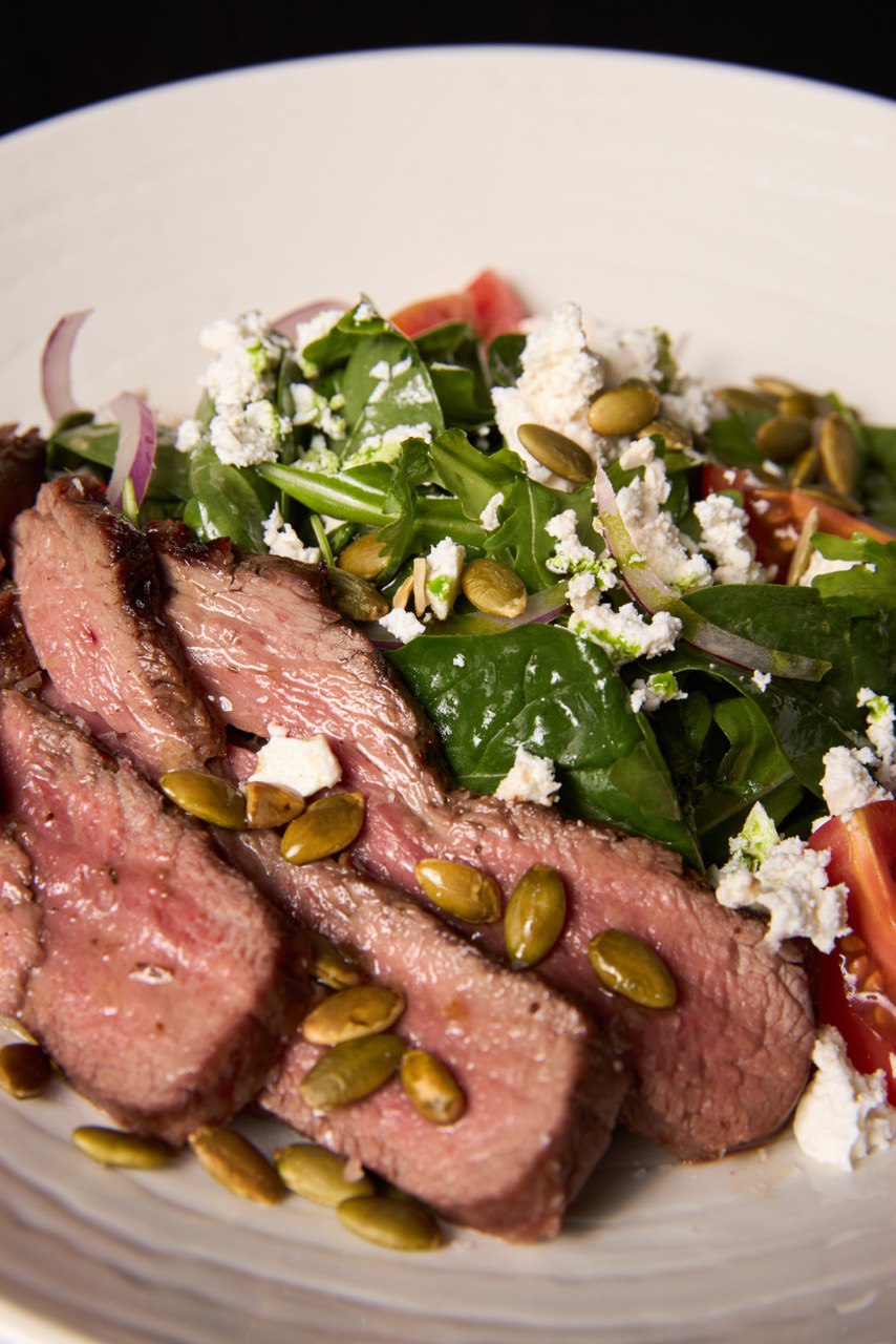 Salad with pumpkin cream and beef
